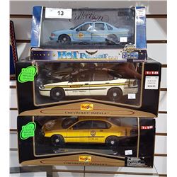 THREE DIE CAST POLICE CARS