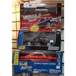 THREE COLLECTIBLE DIE CAST CARS