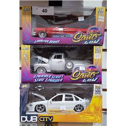 THREE COLLECTIBLE DIE CAST CARS