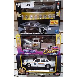 THREE COLLECTIBLE DIE CAST CARS