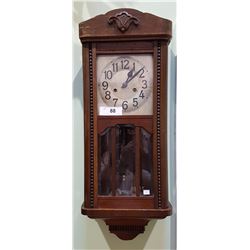 A. PONCHIER WALL CLOCK W/KEY & PENDULUM