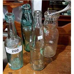 LOT OF 4 GLASS BOTTLES INC CREAM BOTTLE AND SPOONS