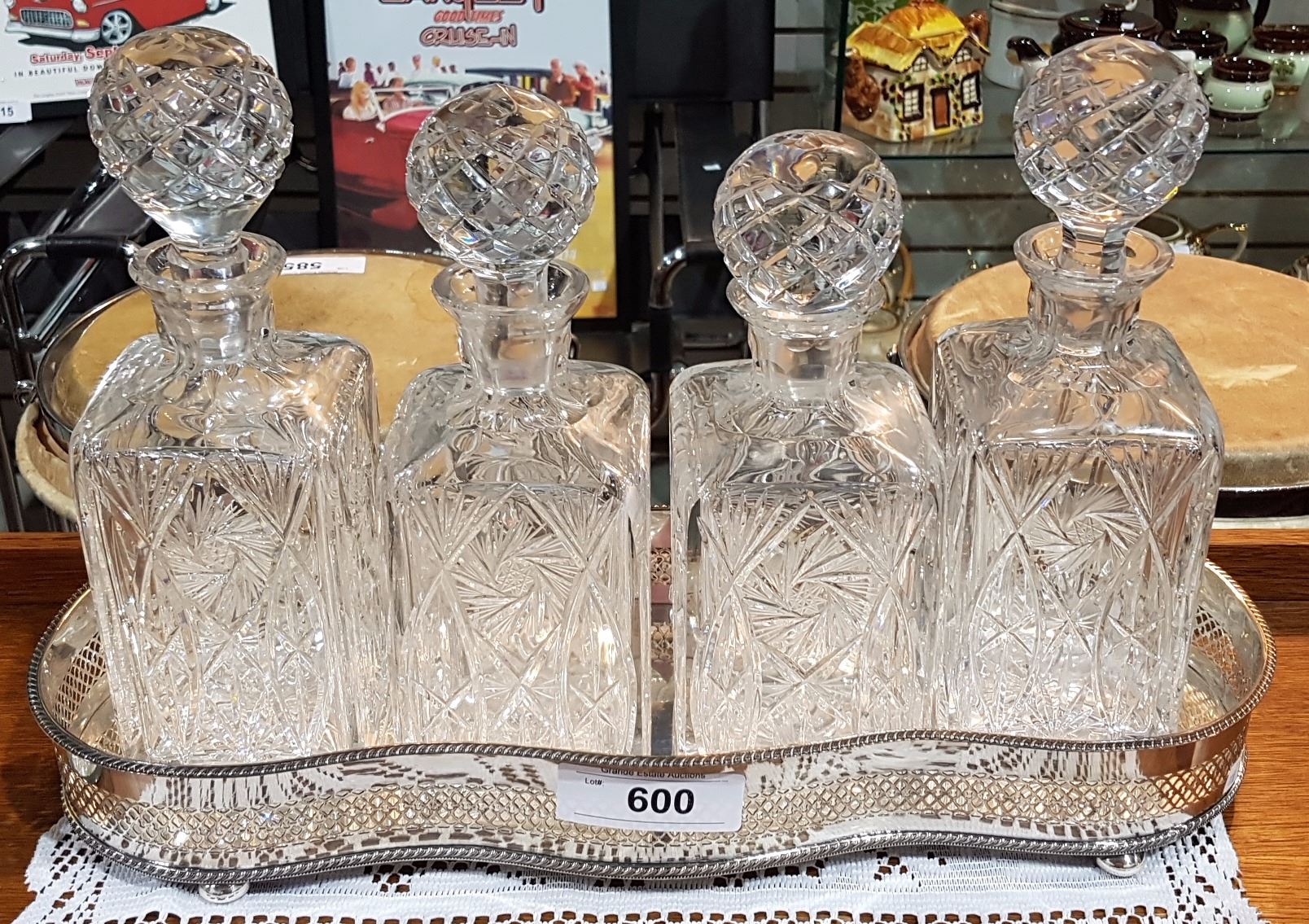 SET OF 4 PINWHEEL CRYSTAL DECANTERS IN STAND