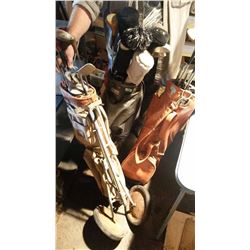 Assorted Golf Clubs With Carriers