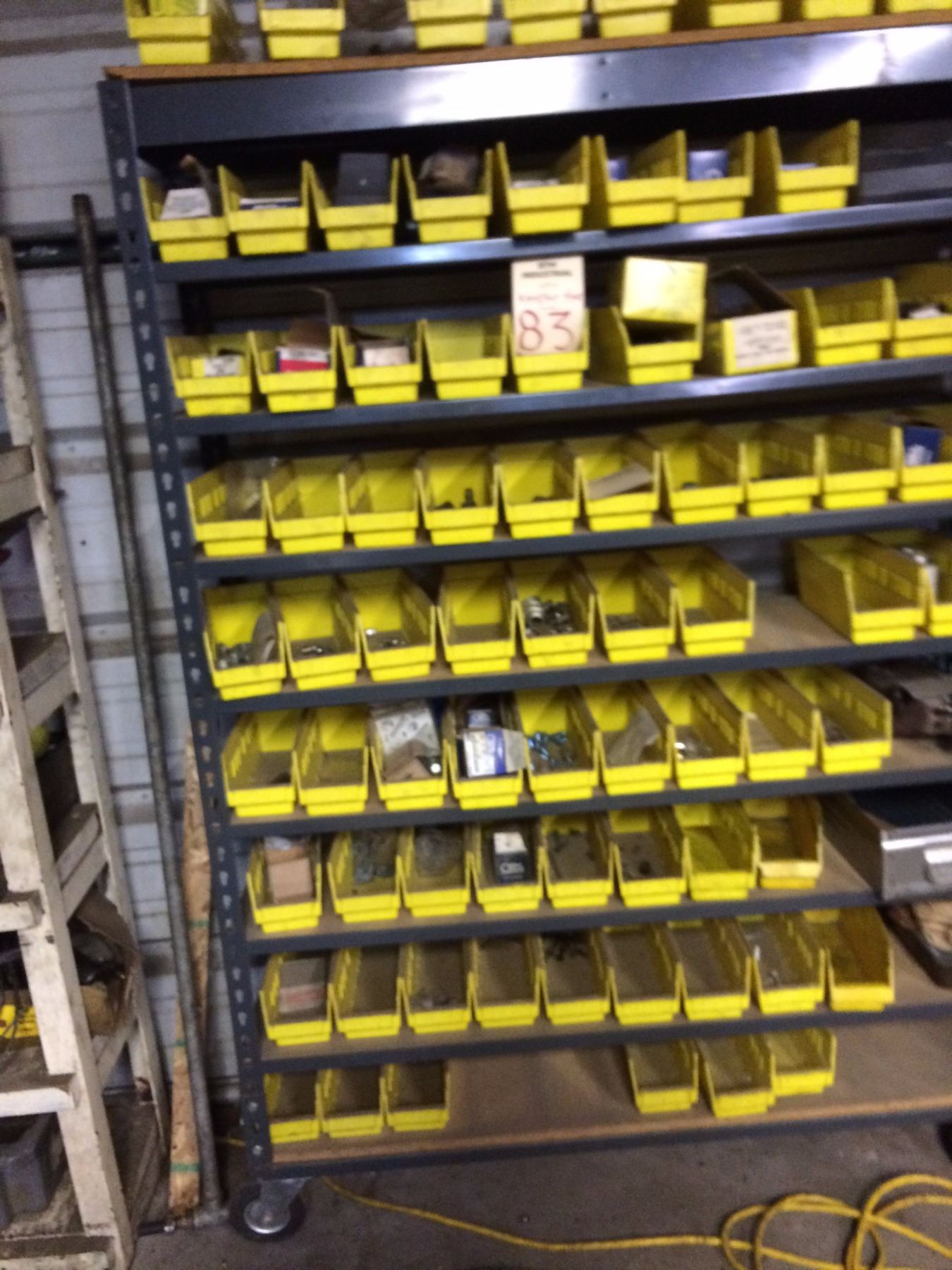 72” x 42” X 14” nut and bolt Rack and all contents on caster