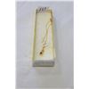 Image 1 : 14KT PLATED NECKLACE WITH BLUE SAPHIRE AND CUBIC ZIRCONIA STONES