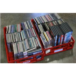 TWO TRAYS OF CDS AND DVDS