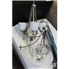 Image 1 : TWO MODERN STAINLESS AND GLASS CHANDELIERS