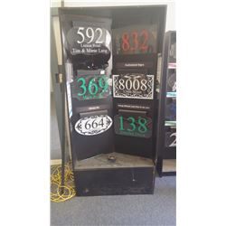 Display shelving with LED lit signs as pictured