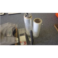 Tray with office trays; POS debit machine; shrink wrap holder with extra roll; playing cards in tray