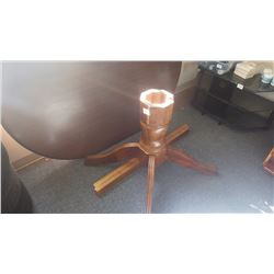 Oval centre pedestal wood table