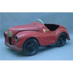 A late 1930's Austin A40 pedal car, having rising bonnet enclosing stylised engine, fitted pneuma...