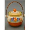 Image 1 : A Clarice Cliff 'Crocus' pattern biscuit barrel and cover, of circular shape, with flattened circ...