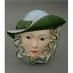 A Crown Devon face mask by Dorothy Ann, modelled as a fashionable 1930's lady, L 9ins...