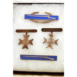 Four Sterling Silver Military Badges