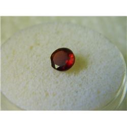 GEM STONE - ROUND FACETED BROWN/ RED GARNET 6.1D X 3.2H mm - ~0.84CT - OFFSET SIDE - SEE PICTURE