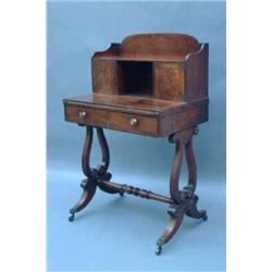 A Regency mahogany bonheur du jour, the superstructure with open recess, flanked by two doors, ov...