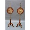 Image 1 : A pair of Victorian walnut pole screens, having circular fret-cut and pierced screens, inset with...