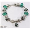 Image 1 : PANDORA STYLE BRACELET W/ GREEN GLASS AND SILVER