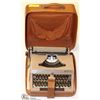 Image 1 : ANTIQUE ERIKA TYPEWRITER IN LEATHER TRAVEL CASE