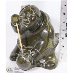 1972 STAMPED INUIT AND SEAL GREEN STONE CARVING