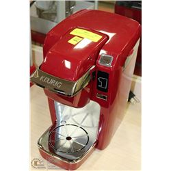 RED KEURIG COFFEE MACHINE-WORKING