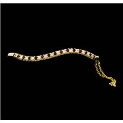 14KT Yellow Gold 0.70ct. Ruby and Diamond Bangle Bracelet