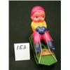 Image 1 : WIND-UP Celluloid Child in Sled - OJ