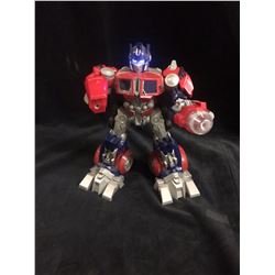 OPTIMUS PRIME TRANSFORMER (SPEAKING/ STOMPING TOY)