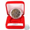 Image 1 : 2007 Canada 1oz Fine Silver Maple Leaf (TAX Exempt). Coin comes encapsulated in a red presentation c