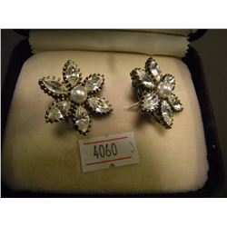 PAIR OF FLORAL CLIP ON EARRINGS