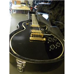 GIBSON LES PAUL CUSTOM EBONY FINISHED GOLD TRIM GUITAR/WITH GIBSON CASE (authenticity unknown)(pawn 