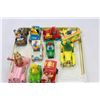 Image 2 : LOT OF DIE CAST MUFFETS SMURFS AND SESEME STREET CARS