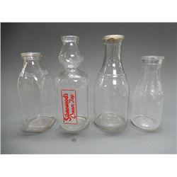 LOT OF 4 DAIRY BOTTLES