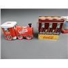 Image 6 : LOT OF 13 COCA-COLA COLLECTIBLES 2 SETS SALT & PEPPER SHAKERS, MOVIE POPCORN BUCKET, 7 TINS, 2 MUGS,