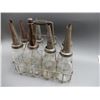 Image 1 : 8 QT. OIL BOTTLES WITH WIRE RACK CARRIER 5 ECO SPOUTS LOCATION: SUPERTEST ROOM