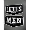 Image 1 : SUPERTEST LADIES & MEN D/S PLASTIC WASHROOM SIGNS GOOD CONDITION- 13" X 7 3/4" LOCATION: LOWER RIGHT