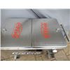 Image 3 : STAINLESS COKE COOLER ON CART - 2 DOORS OPENER- CAP CONTAINER - 40" X 24 1/2" X 35" LOCATION: SODA S