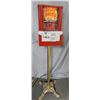 Image 1 : HOT NUT COIN DISPENSER ON ORNATE BASE 13" X 13" X 48" LOCATION: SODA SHOP