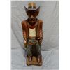 Image 1 : WOODEN CARVED COWBOY STATUE 40" X 12" X 9" LOCATION: UPPER LEFT