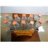 Image 2 : SHELL 10 OIL BOTTLE PAINTED METAL RACK SURFACE RUST - 10 IMP QT BOTTLES WITH SAE 10 CAPS LOCATION: L