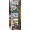 Image 1 : RACK WITH COLLECTOR BOOKS ADVERTISING MEMORABILIA- GAS STATION- FARM  TRACTORS- THUNDERBIRD LOCATION