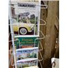 Image 2 : RACK WITH COLLECTOR BOOKS ADVERTISING MEMORABILIA- GAS STATION- FARM  TRACTORS- THUNDERBIRD LOCATION