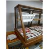 Image 2 : OAK STORE DISPLAY GOOD CONDITION- 57 1/2' X 24 3/4" X 23" - CONTENTS  NOT INCLUDED LOCATION: LOWER B
