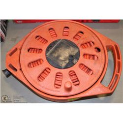 100 FOOT EXTENSION CORD IN CORD CADDIE