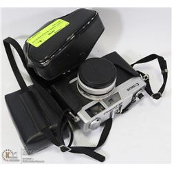 CANON CAMERA WITH FLASH IN ITS OWN CASE