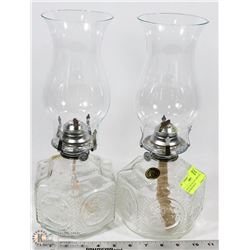SET OF TWO COAL OIL LAMPS WITH DECORATIONS ON