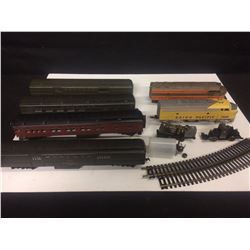 VINTAGE COLLECTIBLE LIONEL TOY TRAINS W/ RAILROAD TRACKS