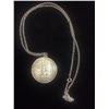 Image 1 : 1958 CANADIAN SILVER DOLLAR IN STERLING SILVER BEZEL