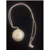 Image 2 : 1958 CANADIAN SILVER DOLLAR IN STERLING SILVER BEZEL